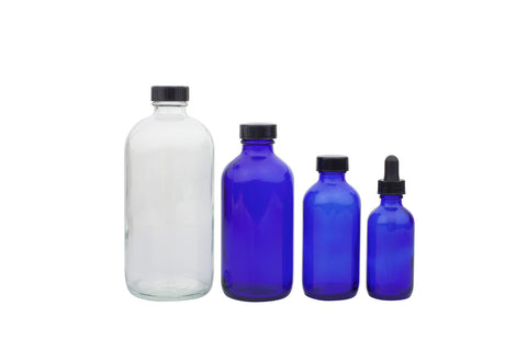 row of 4 empty product bottles